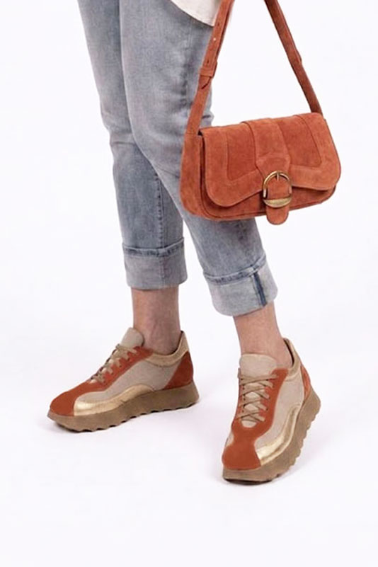 Women's terracotta and gold dress sneakers with round toe and chunky rubber lug sole - Worn view